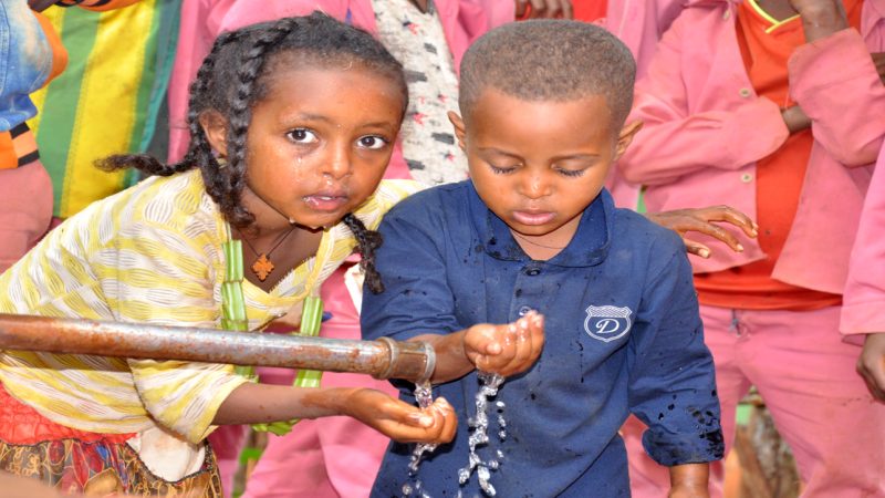 Children in Amhara, Ethiopia learn how to effectively wash their faces to prevent the spread of trachoma.